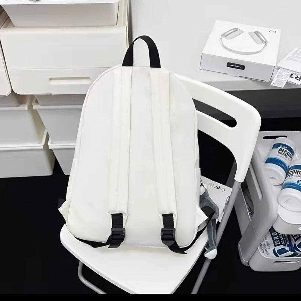 Black Book bag. Chic. Large capacity. Inspired by Bauhaus architecture .Backpack